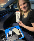 Hella Quick Retractable Car Charger Featuring Four USB C Ports And 120 Watt Output for smartphone and tablet charging in a vehicle.