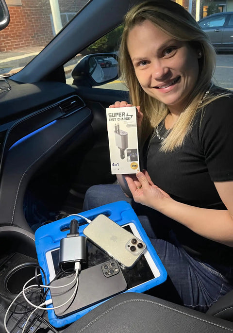 Hella Quick Retractable Car Charger Featuring Four USB C Ports And 120 Watt Output for smartphone and tablet charging in a vehicle.