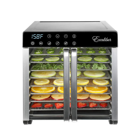 No Nonsense 8 Tray Food Dehydrator For Crankin Out Homestyle Beef Jerky Crispy Veggies And Sweet Fruit With Smart Temp Knob And 80 Hour Digital Clock Plus Hyperwave Air System with displayed sliced fruits and veggies.