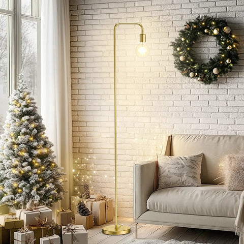 Industrial Floor Lamp With Light Bulb Included, tall metal standing lamp in brushed gold next to sofa and Christmas decor