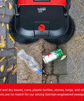 Heavy Duty Turbo Hand Sweeper With Dual Disc Brushes And Beltless Drive Works Like A Super Champ Crushing Fine Dust And Grime Across A 75 Centimeters Sweep Path on various debris.