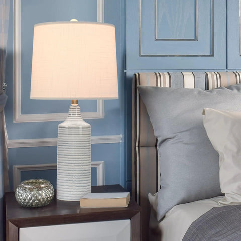 Blue Ceramic Table Lamps Set Of 2 For Nightstand And Living Room on a nightstand, striped blue and gray, cream base, 24.25 inches tall.