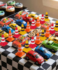 Kick Off Your Events With These Durable Mini Traffic Cones Bulk Pack Designed For Birthday Parties Classroom Drills And Hobby Track Layouts Ready To Roll Anytime Featuring Bold Assorted Colors Straight Up Tough Build, arranged with toy cars on a race-themed table.