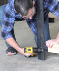 Man assembling Heavy Duty Workbench Kit With ShelfLinks For Garage Shop Or Shed Organization Build A Custom Workspace With Sturdy Brackets