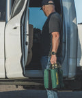 Person holding TackDriver Gun Bag With One Piece Construction And Non Marring Surface For Outdoor Range And Hunting near vehicle
