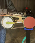 Heavy Duty 2X48 Belt Bench Grinder Attachment With 8 Inch Contact Wheel And 7 Inch Disc No Hassle Quick Change Auto Tensioning Setup Badass Knifemaking And Blade Sharpening Tool in use with sparks flying.