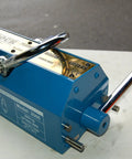 Top Shelf 2000Kg Magnetic Lifter Four Thousand Four Hundred Pound Steel Grabber Hoist with manual control dial.