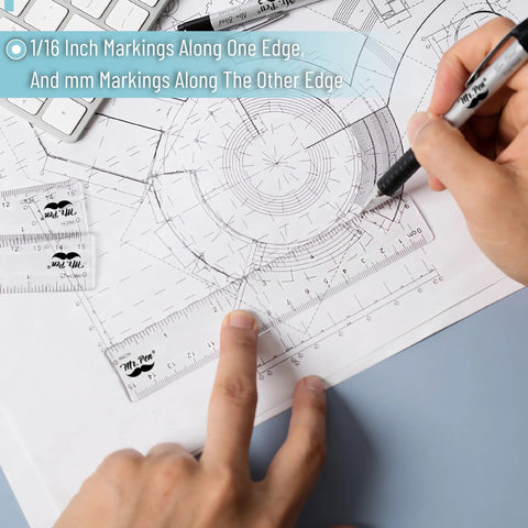 Hand using a clear 6 inch plastic ruler with dual side inches and centimeters over technical drawing, 3 pack included