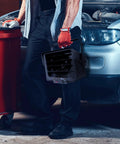 Man holding Rugged Heavy Duty 240 Volt Hardwired Commercial Shop And Garage Heater Cranking 3000 To 6000 Watts in garage.