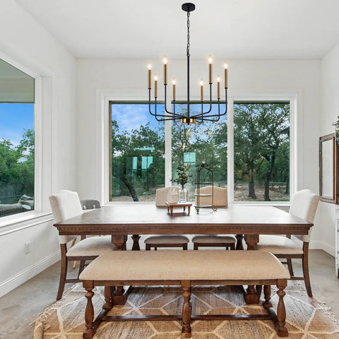 8 Light Farmhouse Chandelier With Dope Black And Gold Finish Modern Candle Pendant Lighting over dining table in bright room
