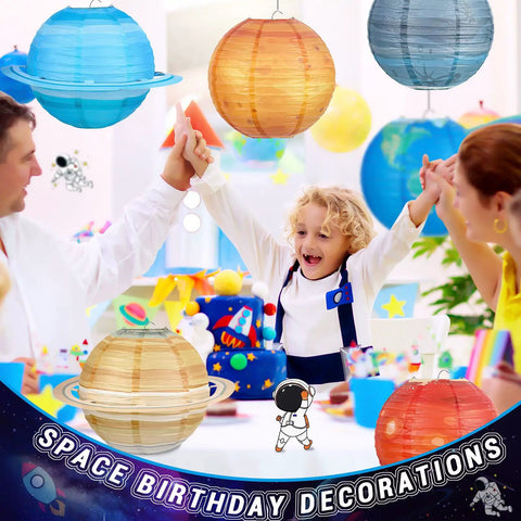 Child celebrates under Eight Pack 12 Inch Space Paper Lanterns With Hanging Planets, Two Sizes, Out Of This World Solar System Theme Party Decorations For Classroom Or Birthday, Outer Space Hanging Decor.