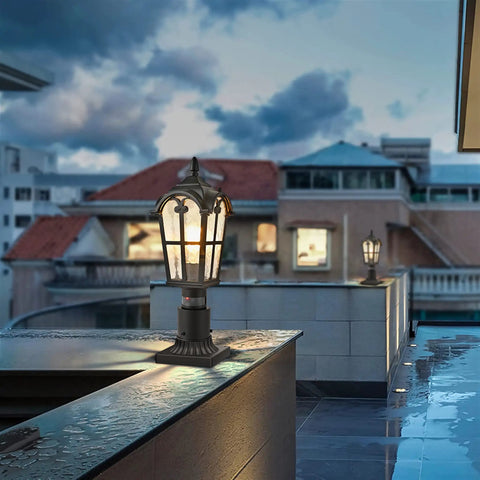 Two Pack 17 Inch Outdoor Post Light Fixtures With Motion Sensor And Dusk To Dawn on modern rooftop, glowing at dusk.