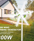 800W Wind Turbine Generator Kit With 12V 24V Output, 6 Blade Windmill installed in a home garden setting