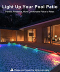 Ambient poolside view with Solar Fence Lights Outdoor Waterproof 4 Pack With Warm White And RGB Color Changing Modes lit up.