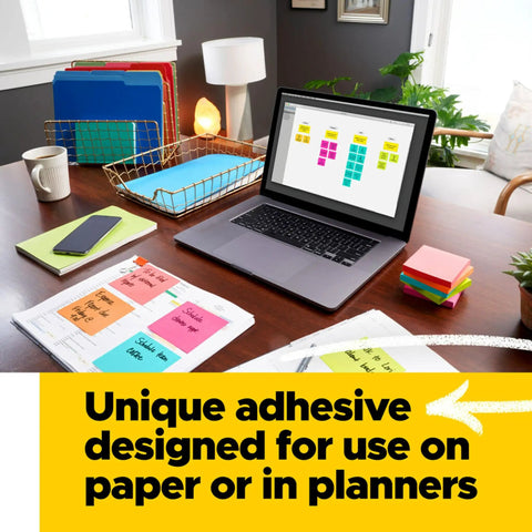Kickass 3x3 Inch Pop Up Dispenser Notes 12 Pack on a desk with laptop, ideal for quick reminders and planning.