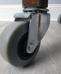 Close-up of Heavy Duty 2 Inch Swivel Stem Caster With Soft TPR Rubber Wheel Seven Sixteenth Inch Stem Non Marking Gray Tread.