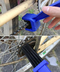 Bike And Motorcycle Chain Cleaning Tool Set 5 Piece Kit Pro Grade With Sprocket Scraper Sprocket Brush shown cleaning bike chain