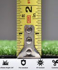 Measuring tape showing pile height on Indoor Batting Cage Turf Mat Set, 0.4 inch pile, synthetic grass, 1950 sq ft total.