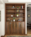 Bookshelf with thick brown wood contact paper peel and stick wood grain wallpaper on cabinets and shelves