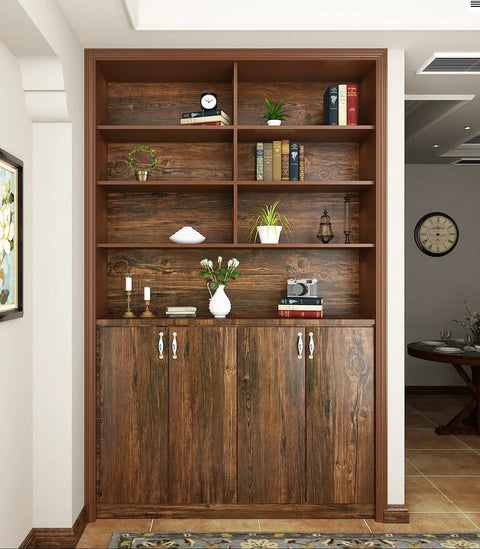 Brown wood grain contact paper peel and stick for cabinets and countertops on bookshelf with decorative items
