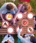 100 Count 7 Inch Red And White Checkered Paper Plates For Parties at picnic table, featuring food, drinks, and outdoor dining.