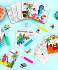 24 Piece Summer Crafts Kit For Kids Ages 4 To 8, Ocean Theme Coloring Puzzles with oceanic designs and colored pens on a table.