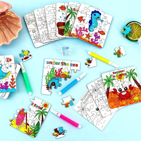 24 Piece Summer Crafts Kit For Kids Ages 4 To 8, Ocean Theme Coloring Puzzles with oceanic designs and colored pens on a table.