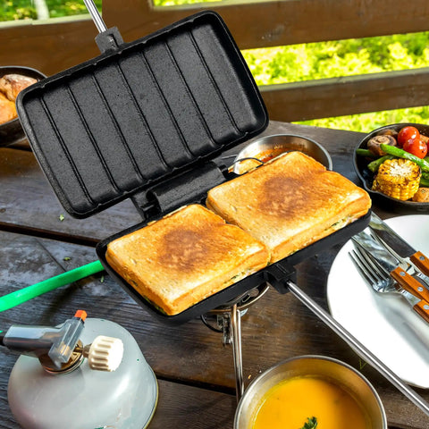 Double Cast Iron Pie Iron For Camping Large Portable Campfire Pie Maker showing toasted sandwiches and open cast iron design.
