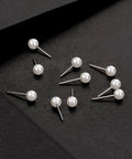5mm Pearl Stud Earrings Set For Women Dope Hypoallergenic Jewelry - Surgical Stainless Steel Lead And Nickel Free 12 Pairs Imitation Round Pearl Earrings Comfortable Everyday Sparkle, 12 white studs on black background