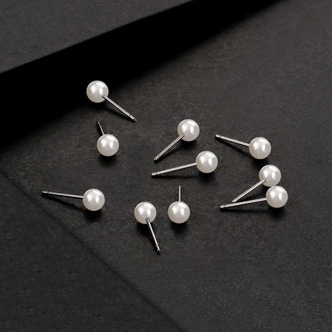 5mm Pearl Stud Earrings Set For Women Dope Hypoallergenic Jewelry - Surgical Stainless Steel Lead And Nickel Free 12 Pairs Imitation Round Pearl Earrings Comfortable Everyday Sparkle, 12 white studs on black background
