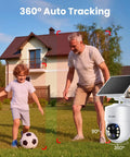 Child and adult playing soccer in garden displaying 4 Camera Solar Powered Outdoor Wireless Security Kit With No Subscription 5MP Ultra HD 360 Degree Auto Motion Tracking 3K Color Night Vision Magnifier Zoom 5G And 2.4G Router Compatible in action