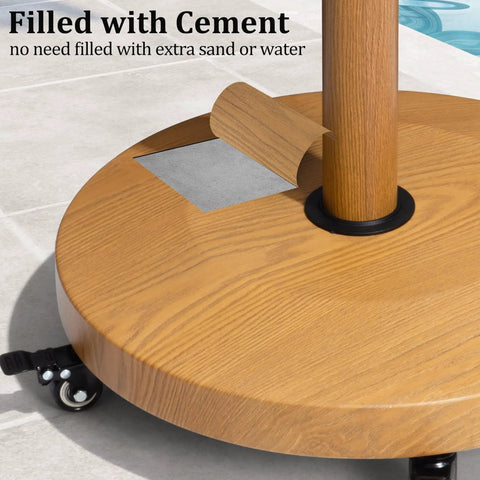 Teak Finish Patio Umbrella Base With Four Wheels, 44 Lb Round Heavy Duty Concrete Stand showing detail of cement fill and wood finish.