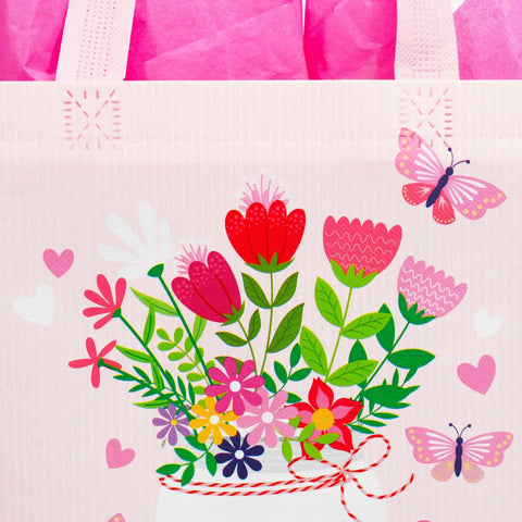 Mother's Day Gift Bags With Tissue Paper Floral Non-Woven Design 10x8x4.7 Inches Pink And Blue Two Pack Ideal For Wrapping Gifts For Mom Or Any Special Occasion, close-up of floral pattern with butterflies.