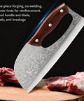 Close-up of 2 Piece Beast Mode Meat Cleaver Knife Set with wood handle and forged blade, slicing meat on a wooden board