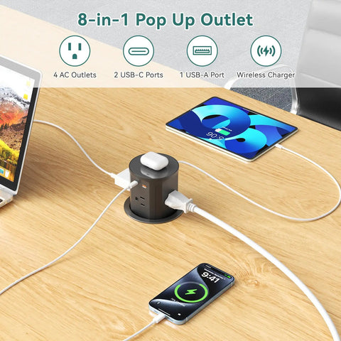 Pop Up Outlet With Wireless Charger And USB C Slick Retractable Recessed Power Station shown on desk charging devices