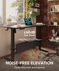 MALOL 56 Inch Electric Standing Desk With Adjustable Footrest Black shown in serene home office, featuring a digital display and quiet operation.