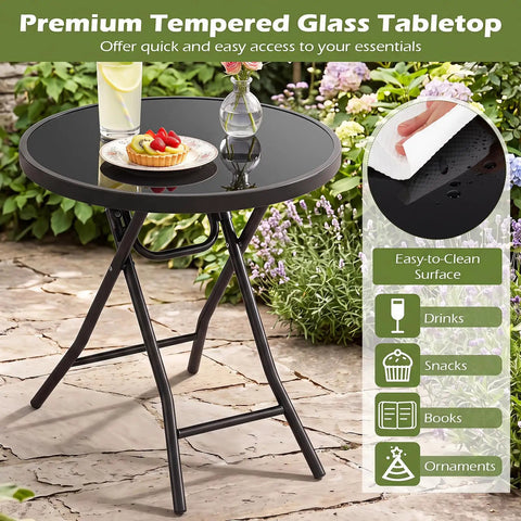 Compact Outdoor Folding Side Table With Tempered Glass Top And Heavy Duty Steel Frame For Backyard Hangouts, round table with snacks and drinks.