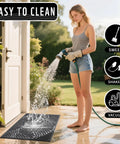 Woman cleaning All Weather Outdoor Doormat With Simple Stripes Waterproof Non Slip Heavy Duty Front Door Mat For Indoor Garage And Patio Dark Grey 29 By 17 Inches Now with hose