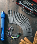 Blue Pin Vise Hand Drill Set With 74 Micro Twist Drill Bits and 20 PCB Mini Bits arranged on wooden surface