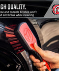 Hand using Premium Tire Brush For Car Detailing And Tire Cleaning With Soft Bristles Rubberized Head And Grippy Handle