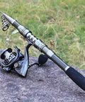 Travel Ready Telescopic Fishing Rod Combo With Spinning Reel And Carrier Bag Includes Lures And Line For Saltwater And Freshwater Angling Kit Grab And Go 1.8M Telescopic Pole For Easy Travel on rock background