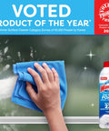 Windex Fast Shine Foam Glass Cleaner spray bottle with blue label, 19 oz, 2-pack, beside a hand wiping a window