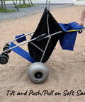 Beach Cart With Balloon Wheels, Heavy Duty Steel Wagon That Rolls Smoothly Over Sand, blue fabric and steel frame on sandy beach