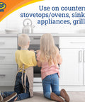Children sitting in front of an oven in a kitchen, Citrus Degreaser Wipes For Heavy Duty Grease Messes No Rinse Kitchen Cleaner