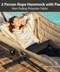 Outdoor Double Hammock With Hardwood Spreader Bars, 475 lbs capacity, tan quilted polyester pad, by poolside