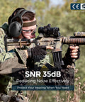 Person wearing Noise Cancelling Ear Muffs For Adults And Kids With 35dB Hearing Protection during outdoor shooting