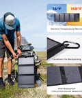 Person setting up 28W Portable Solar Charger That Slays The Day With Dual USB C And USB A for camping, shown with carabiners attached to backpack.