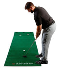 Man practicing putts on Odyssey 10 Foot Indoor Putting Green Mat For Home Or Office Practice With Realistic Surface And Extended Length