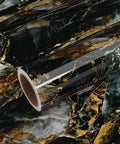 Slate Gold Marble Countertop Contact Paper Peel And Stick Self Adhesive Vinyl Waterproof DIY Friendly Glossy Finish For Kitchen And Bathroom Countertops 15.7 Inch Wide By 118 Inch Long Roll showing glossy marble pattern