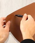 Hella Smooth Rotary Leather Burnisher Bits Set With Multi Groove Polishing Heads For Precision Edge Shaping On Wood And Leather Providing A Sweet Finish For Your Top Shelf Crafting Projects, showing a hand using a tool on a leather piece.